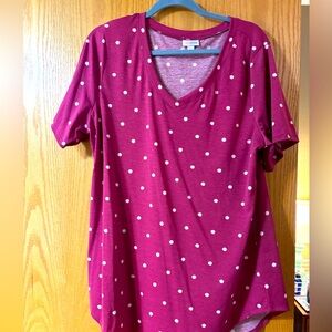 Never been worn LuLaRoe short sleeve swing style top. Size Large.